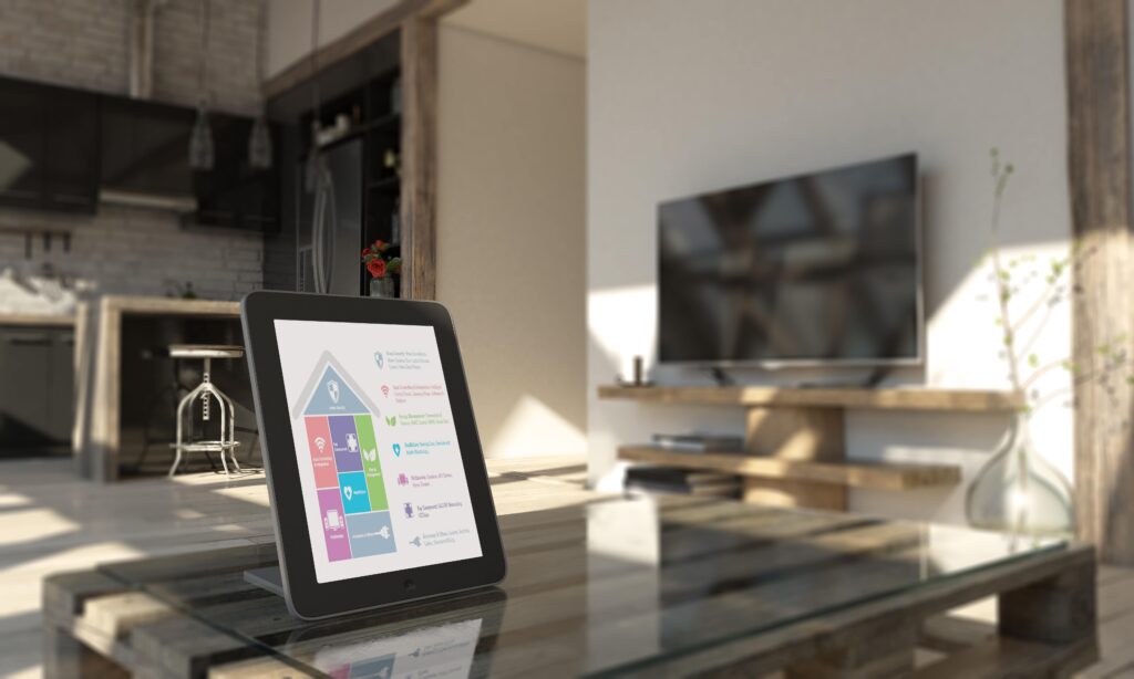 A tablet sitting on a coffee table made of glass and wood in a living room