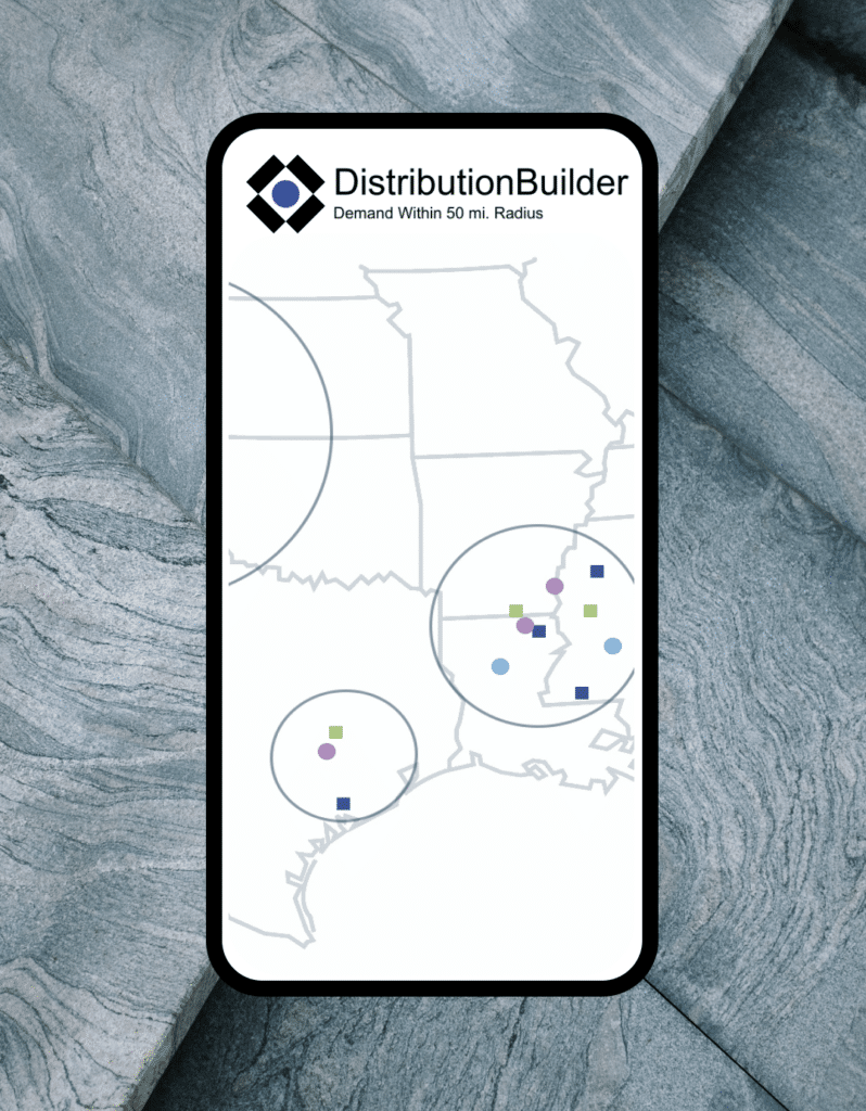 Principia Distribution Builder map interface on a mobile phone. Behind the phone are various pieces of granite